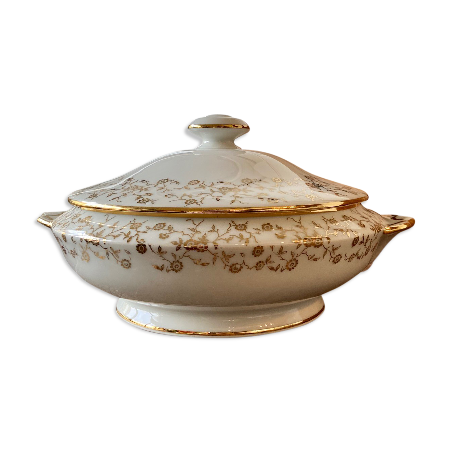 White and gold porcelain soup
