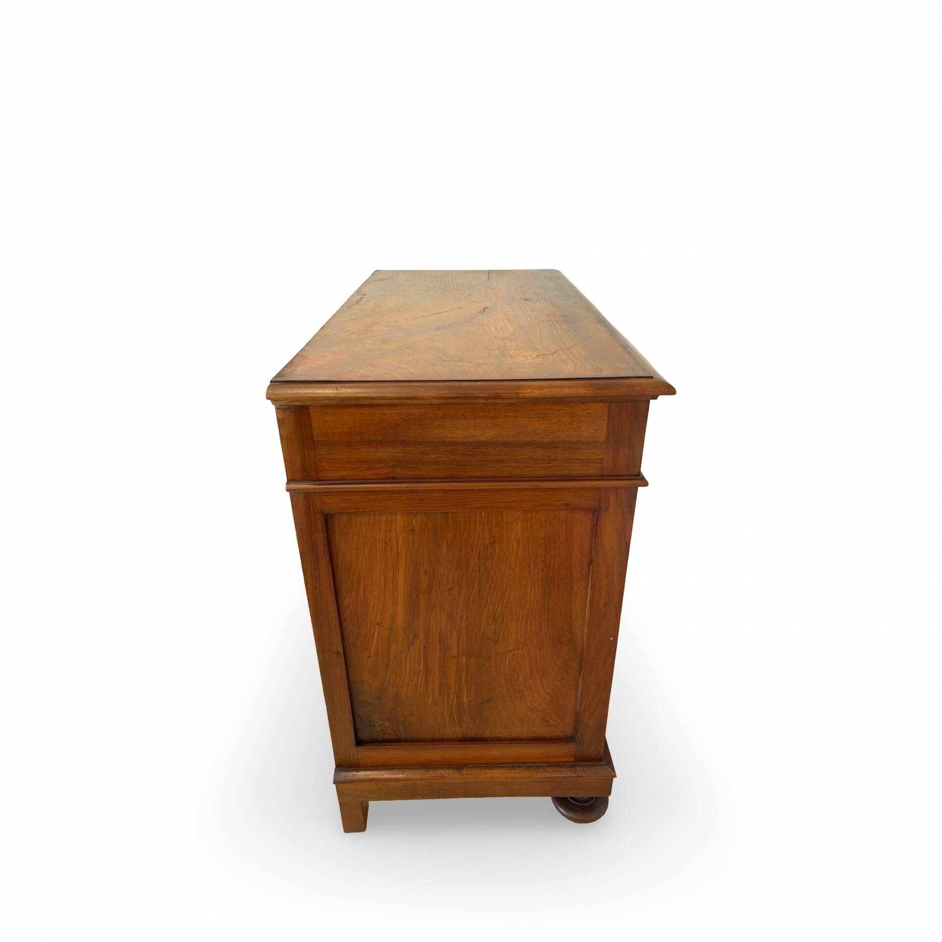 Antique walnut commode with bronze handles in the shape of a lion's mask,