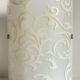 Polished and screen-printed glass sconce by eglo