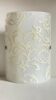 Polished and screen-printed glass sconce by eglo