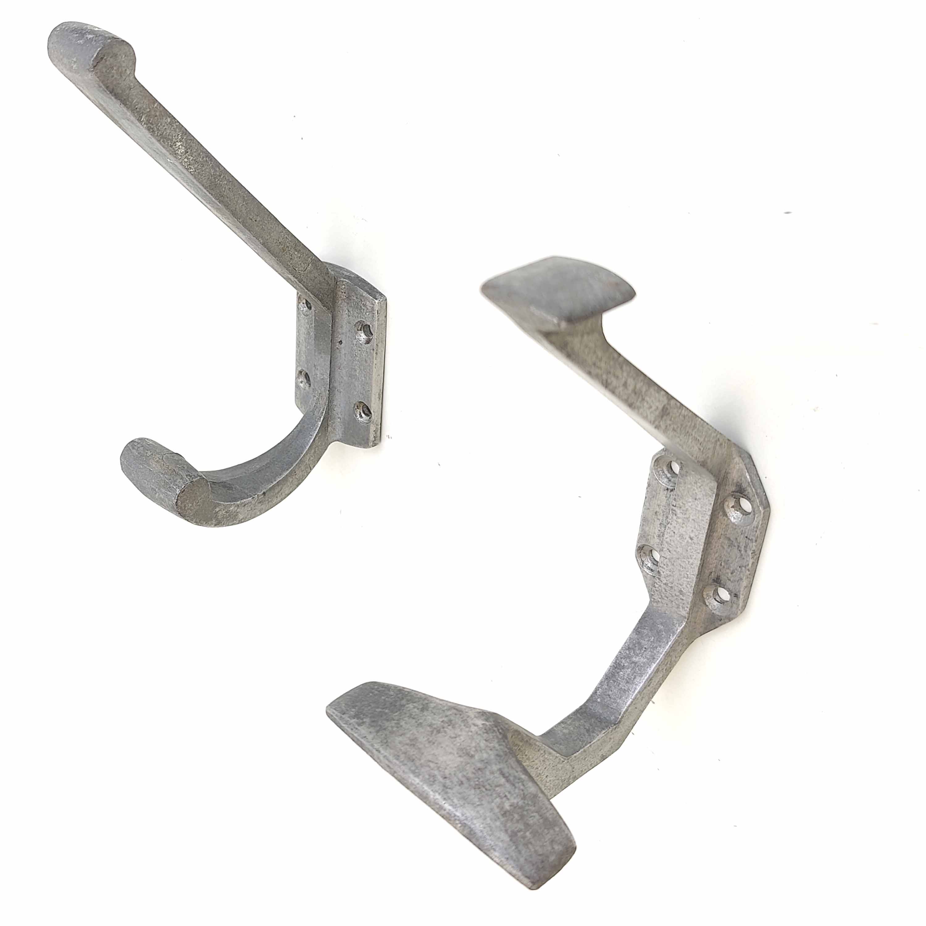 Two mismatched art deco aluminum hooks