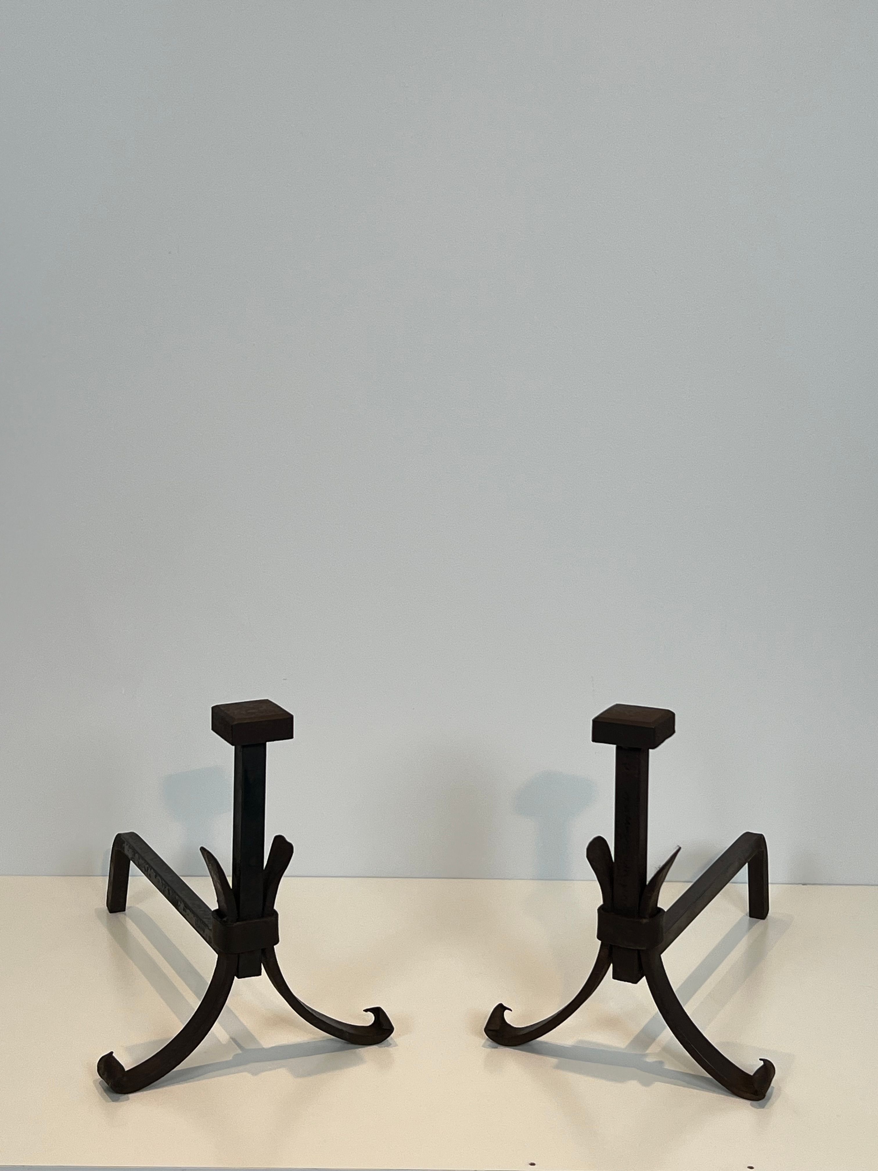 Pair of modernist wrought iron fire dogs
