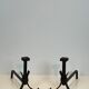 Pair of modernist wrought iron fire dogs
