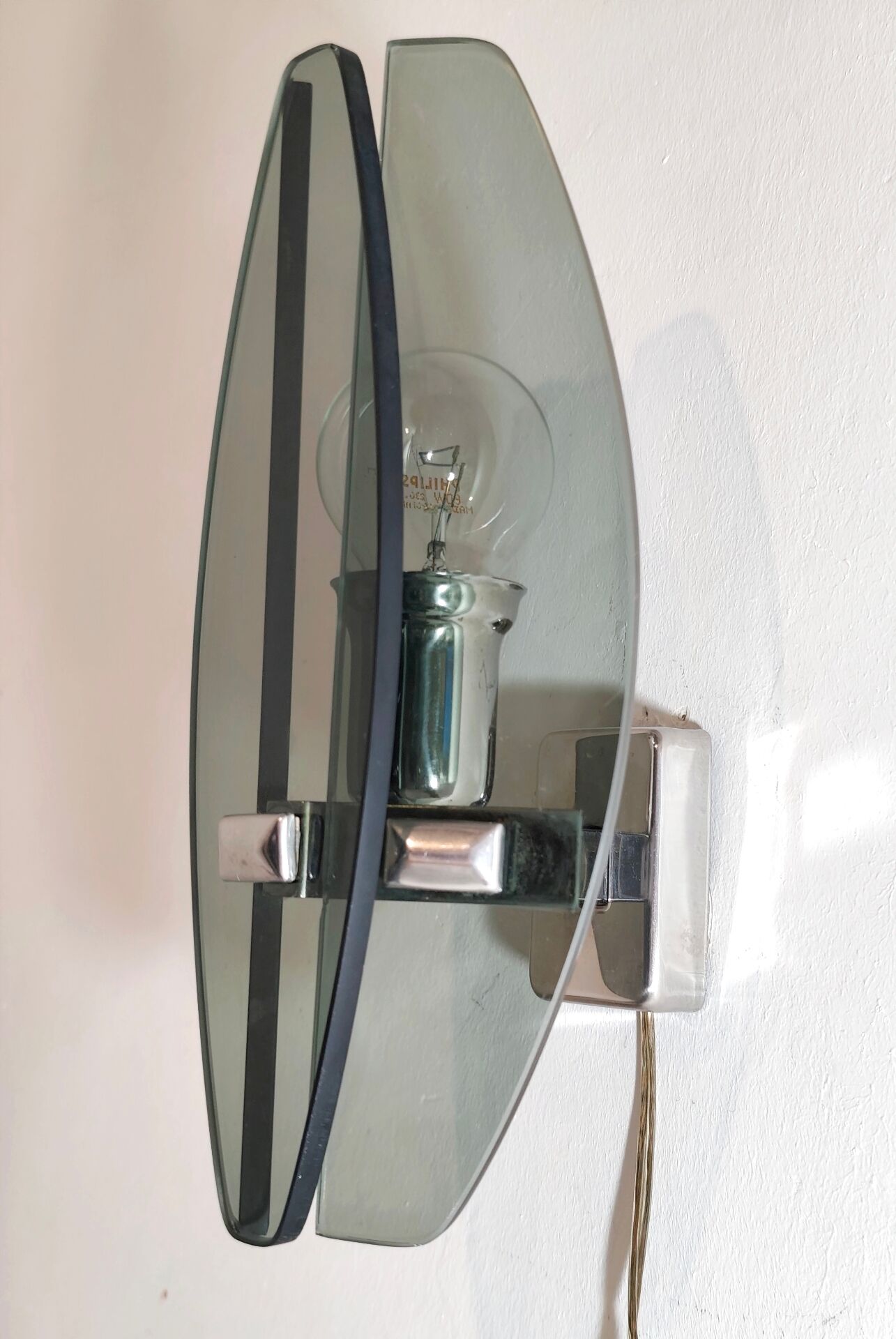 Smoked glass wall sconce. Italy, 1970s.