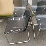 Set of 4 vintage chrome metal and plexiglass chairs