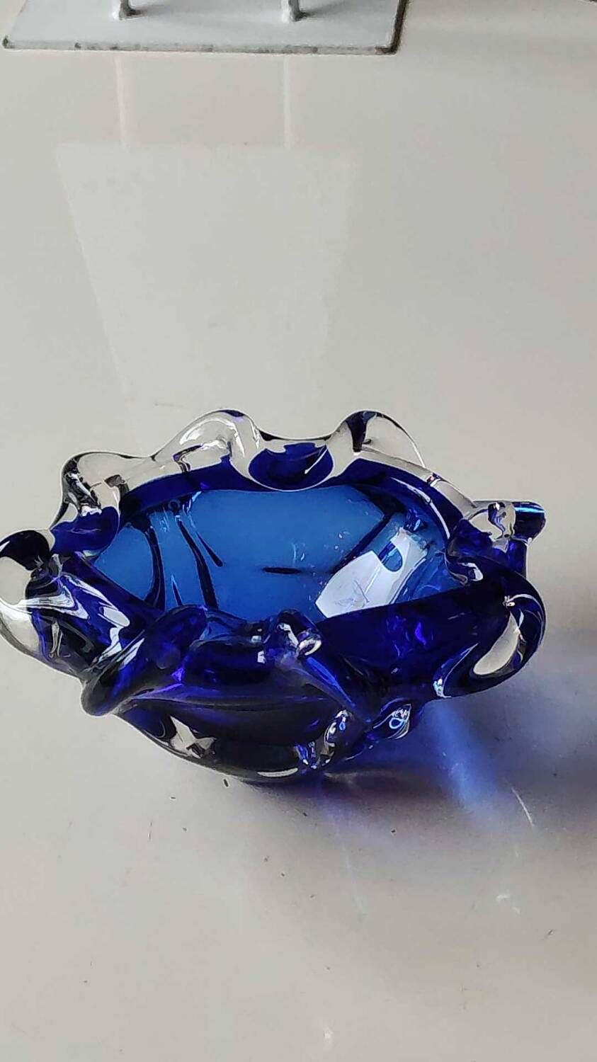Empty pocket blown art glass from Murano Italy, corolla shape, cobalt blue