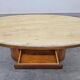 Mid-century coffee table in walnut with a travertine top.