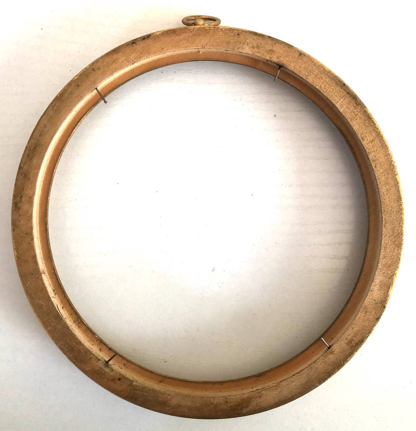 Round golden wood frame