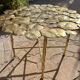 Carved brass coffee table with ginkgo decor
