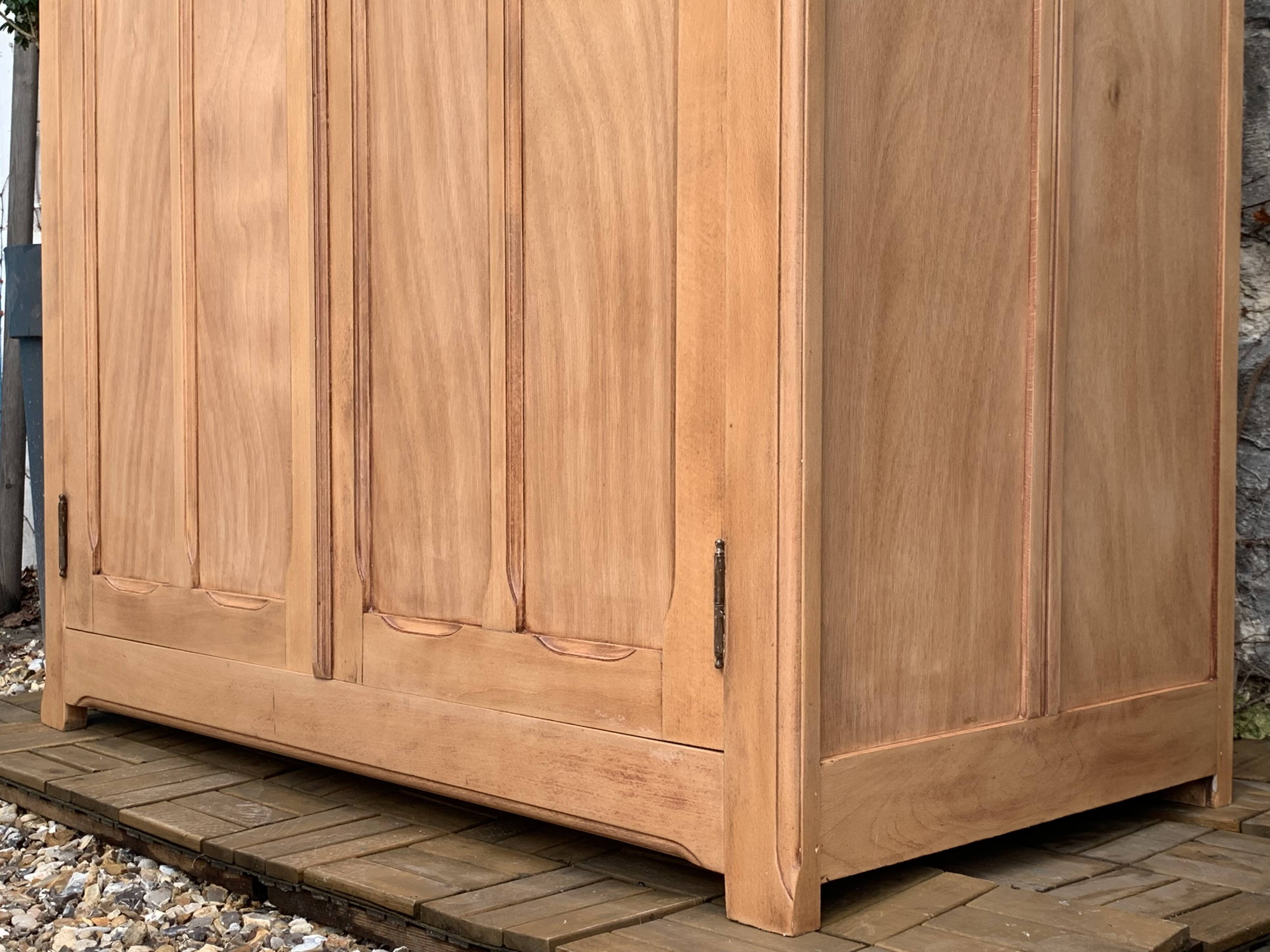 Parisian paneled cabinet in raw wood, 1940
