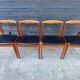 Set of 4 Scandinavian chairs by Johannes Andersen, Vamo Sonderborg, teak and imitation leather, 1960