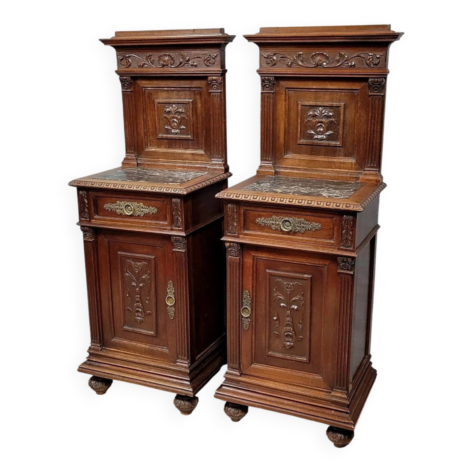 Pair of Renaissance style bedside tables in carved walnut, 19th century