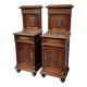 Pair of Renaissance style bedside tables in carved walnut, 19th century