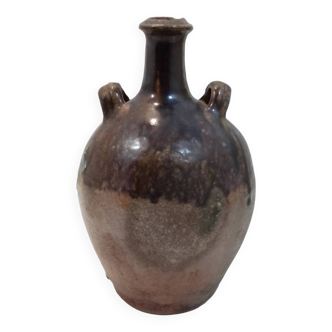Antique enamelled stoneware jug