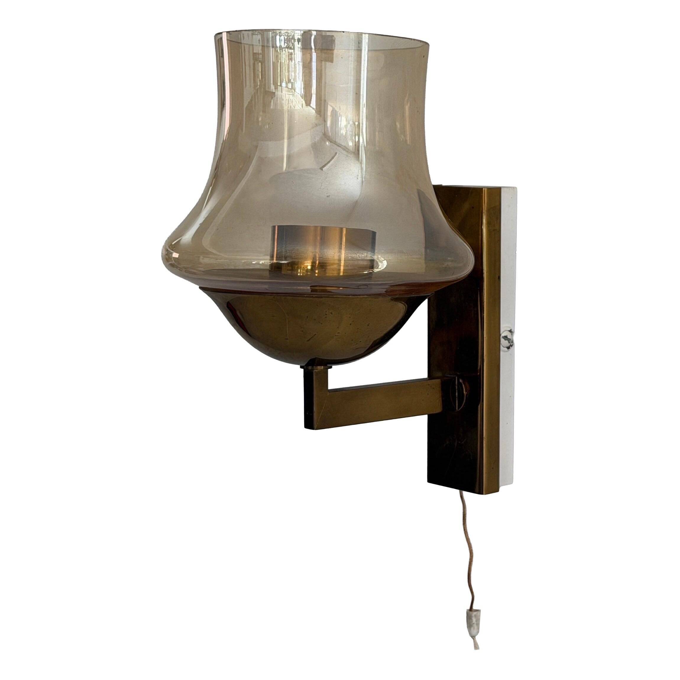 Yellow glass and brass wall light from the mid-century, 1960, Germany.