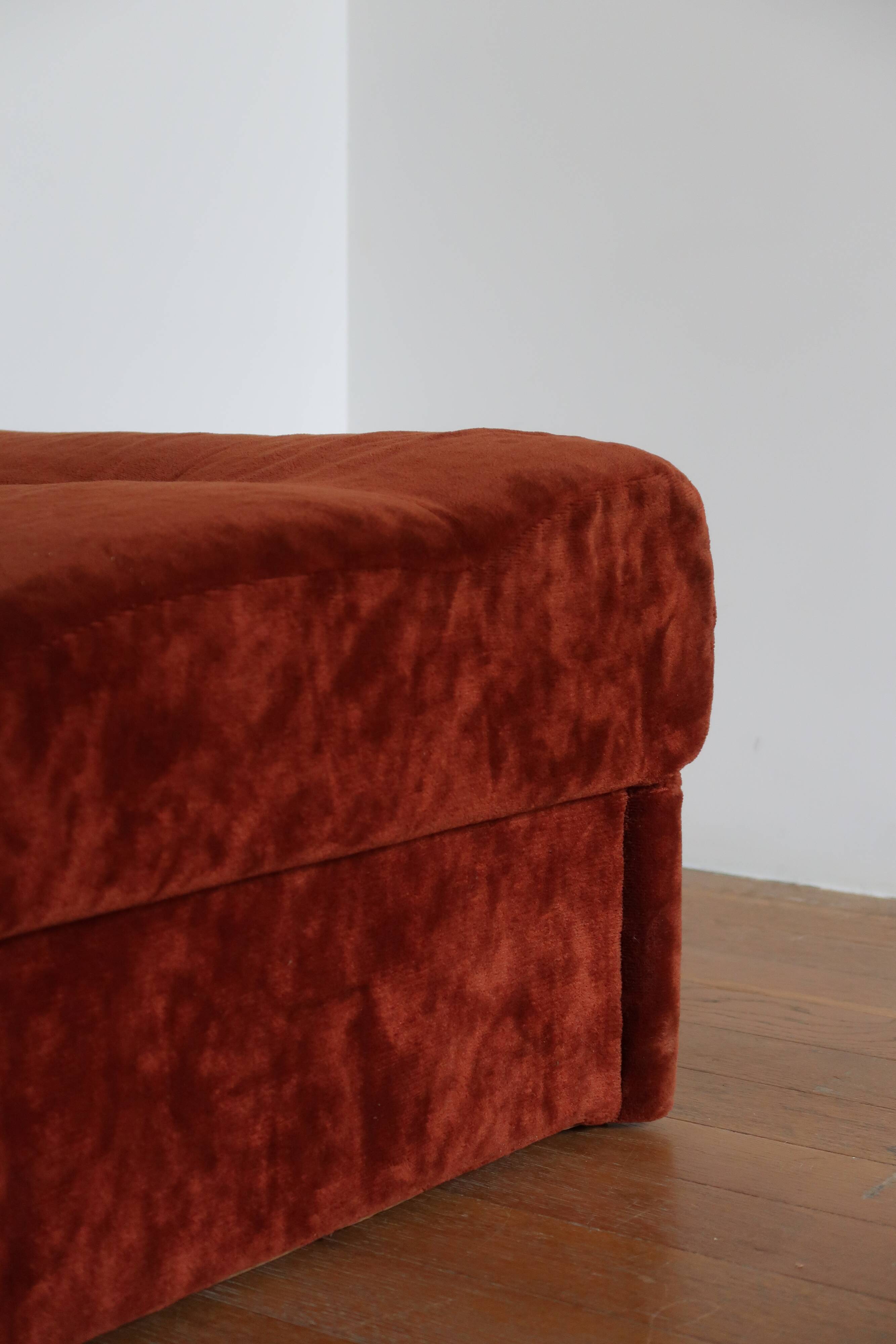 Rusty velvet low chair without arms