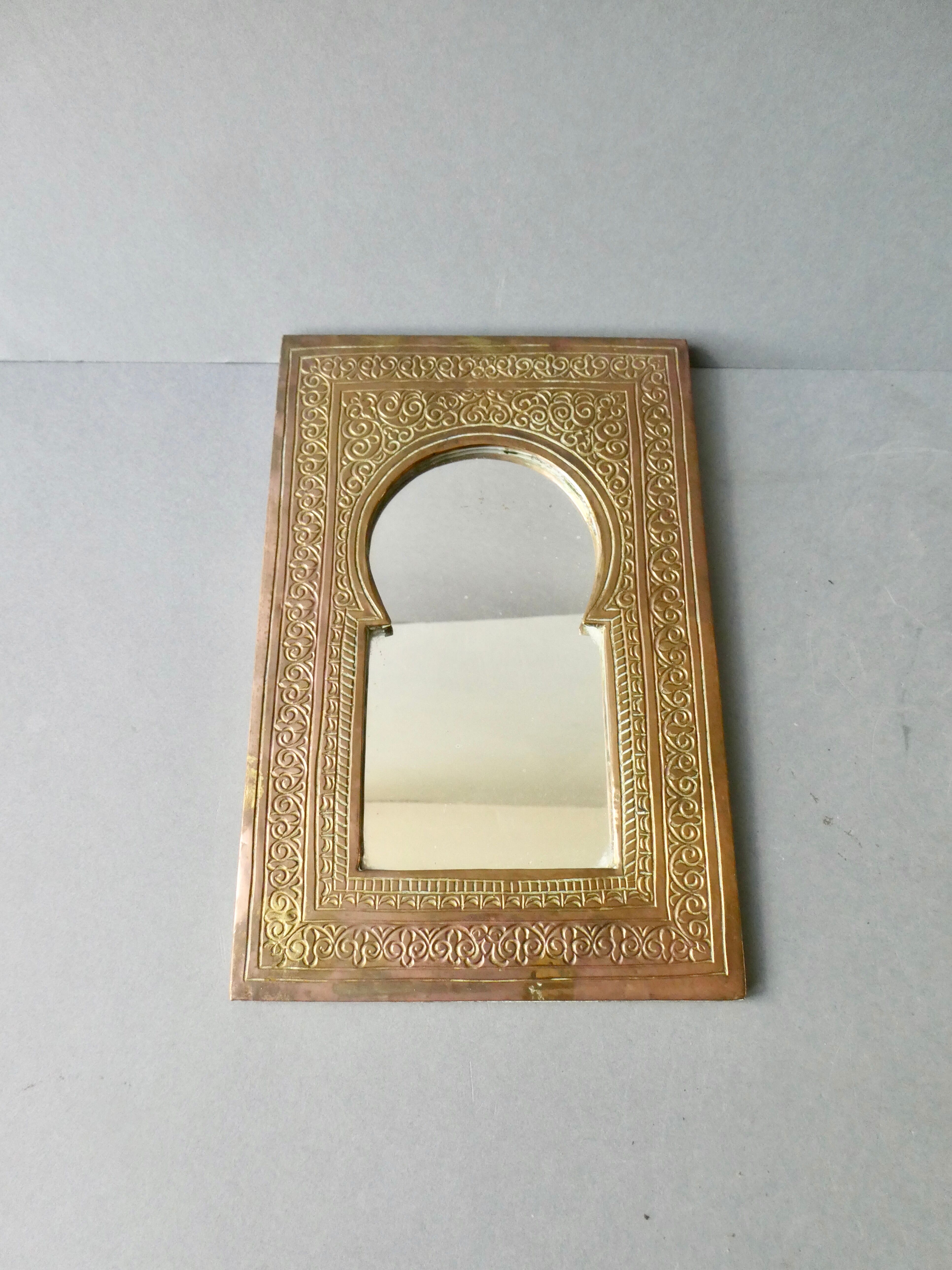 Moroccan mirror in chiseled brass, 70s