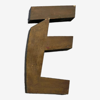 Golden sign letter "E"