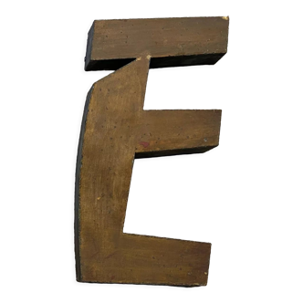Golden sign letter "E"