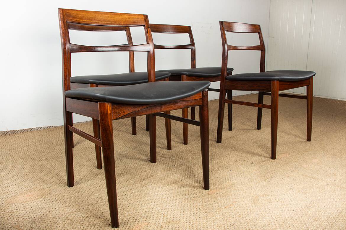4 Danish chairs in rosewood and new leatherette by Henning Kjaernulf 1960.