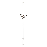 Coat rack from floor to ceiling in lacquered metal and brass. Contemporary.