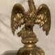 Pair of candle holders in wall, eagle pattern in gilded wood and brass