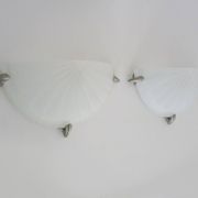 Pair of half-moon wall lights from the 1980s in Italy
