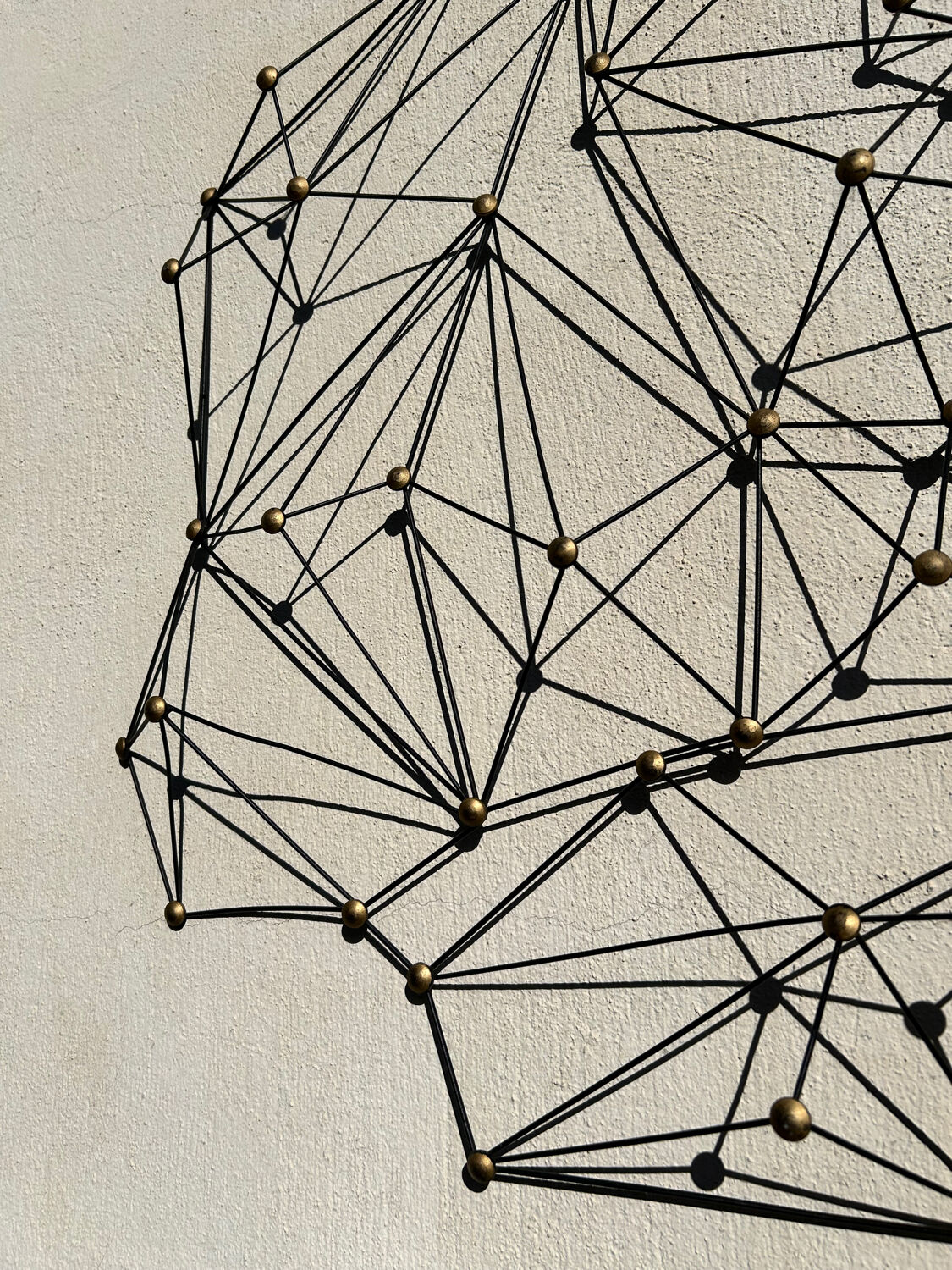 Vintage black metal wall sculpture