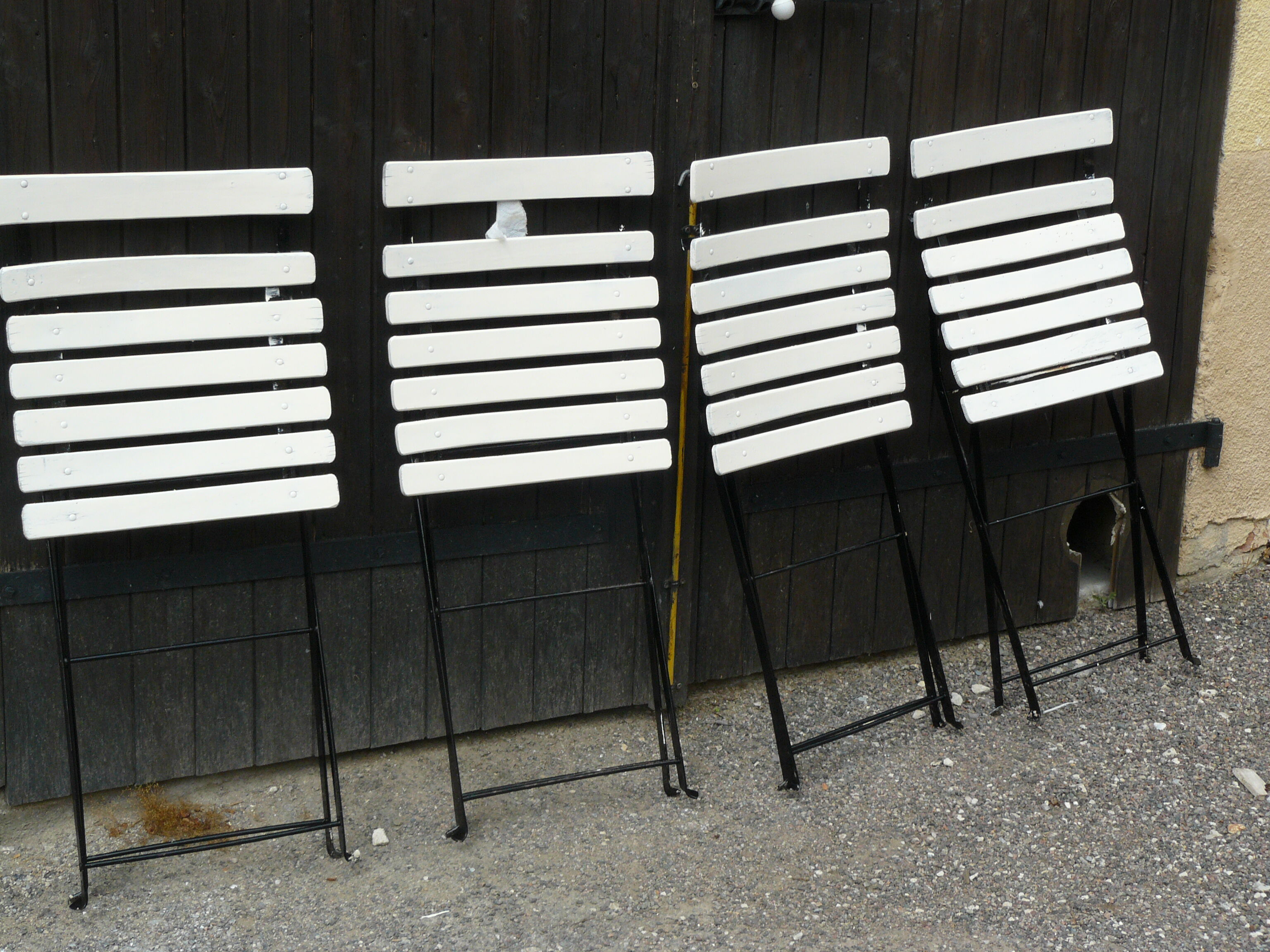 Set of four folding garden chairs