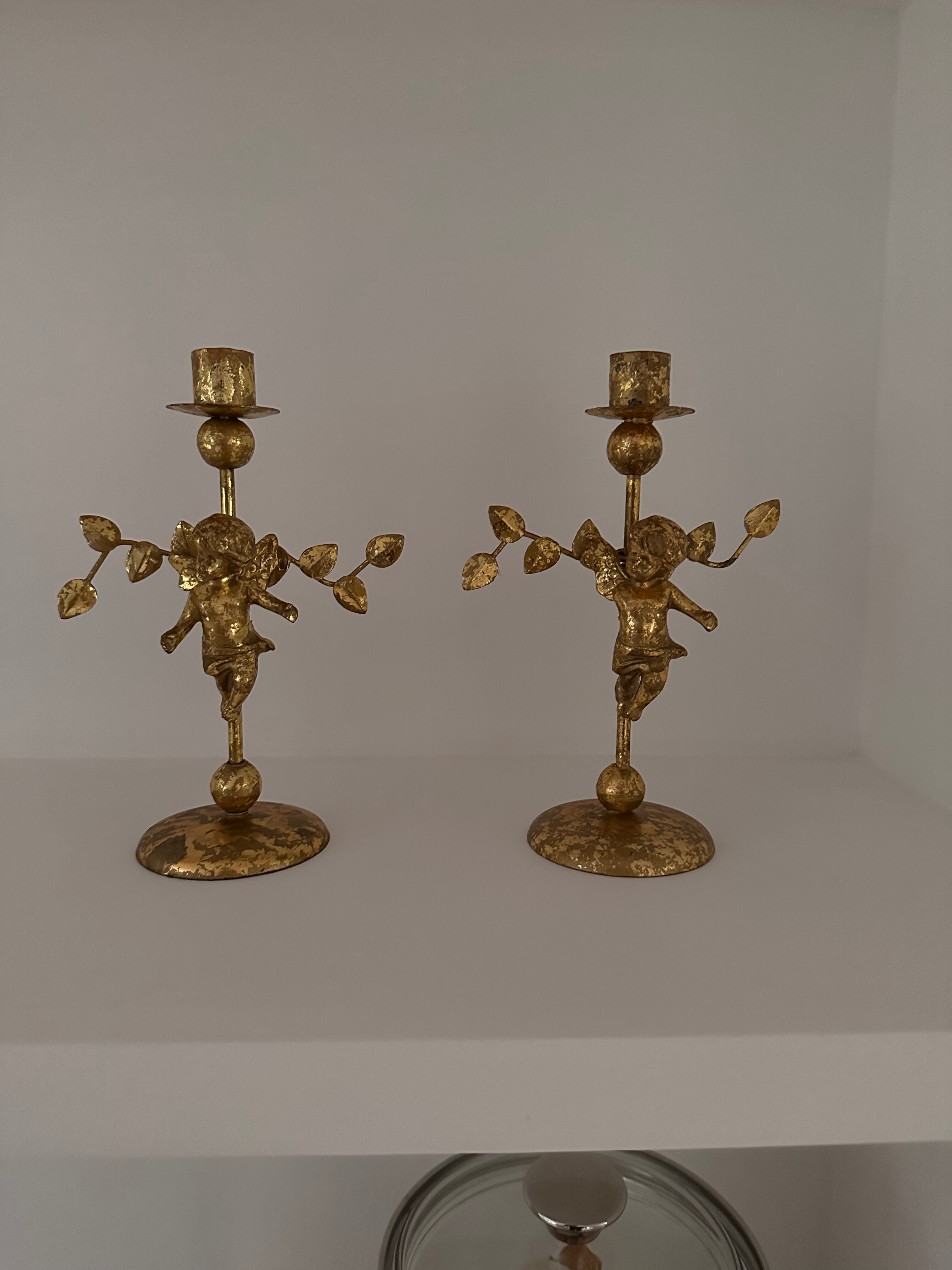 2 golden candlesticks "cherubs"