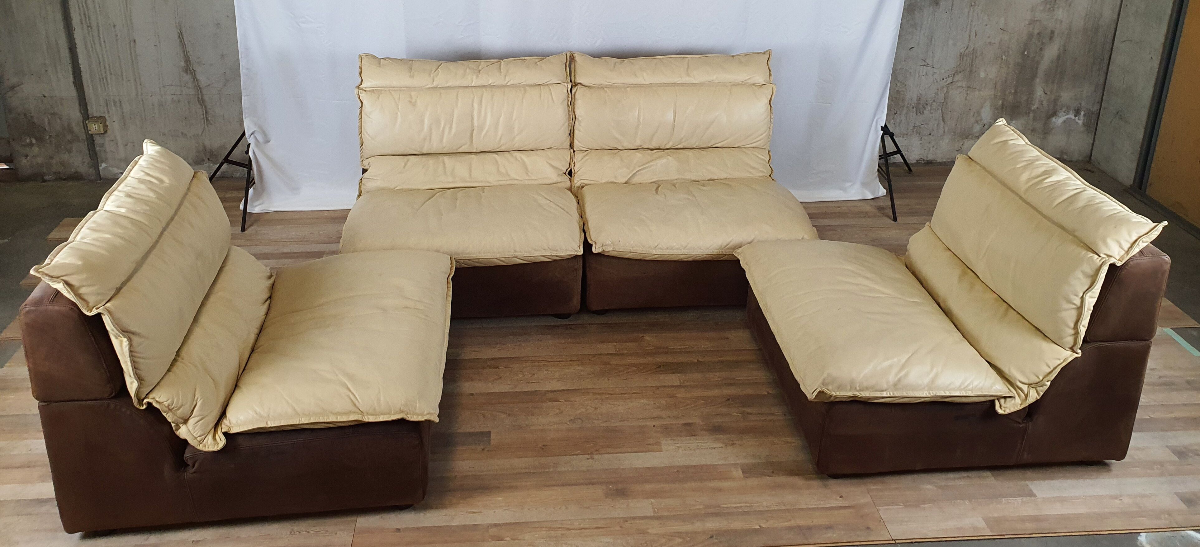 Modular sofa in leather and suede