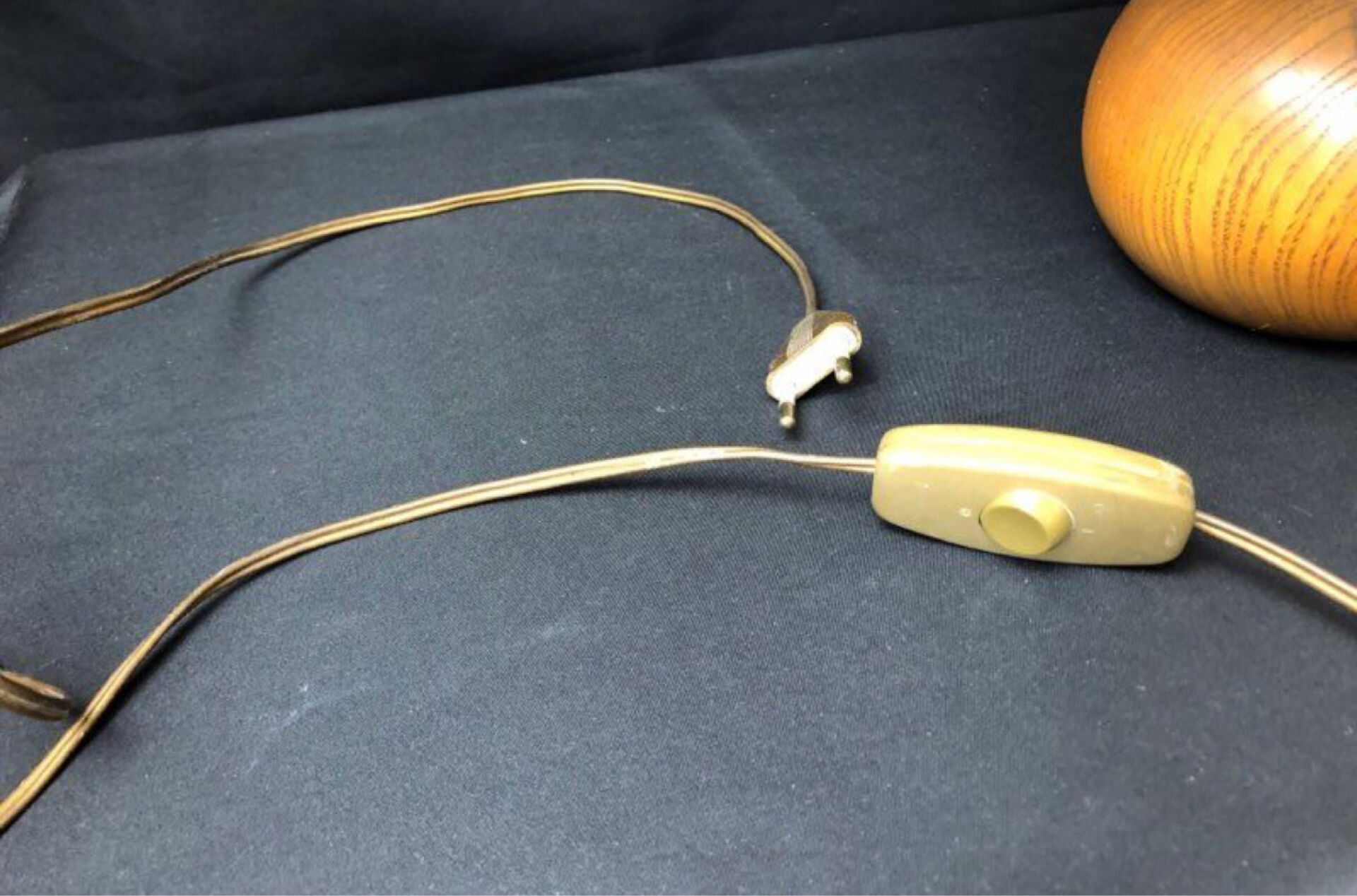 Vintage modernist lamp in wood and hammered copper.