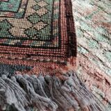 Afghan rug in pastel colors