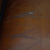 Sheepskin Wingback Chair with Warm Tones and Black Piping