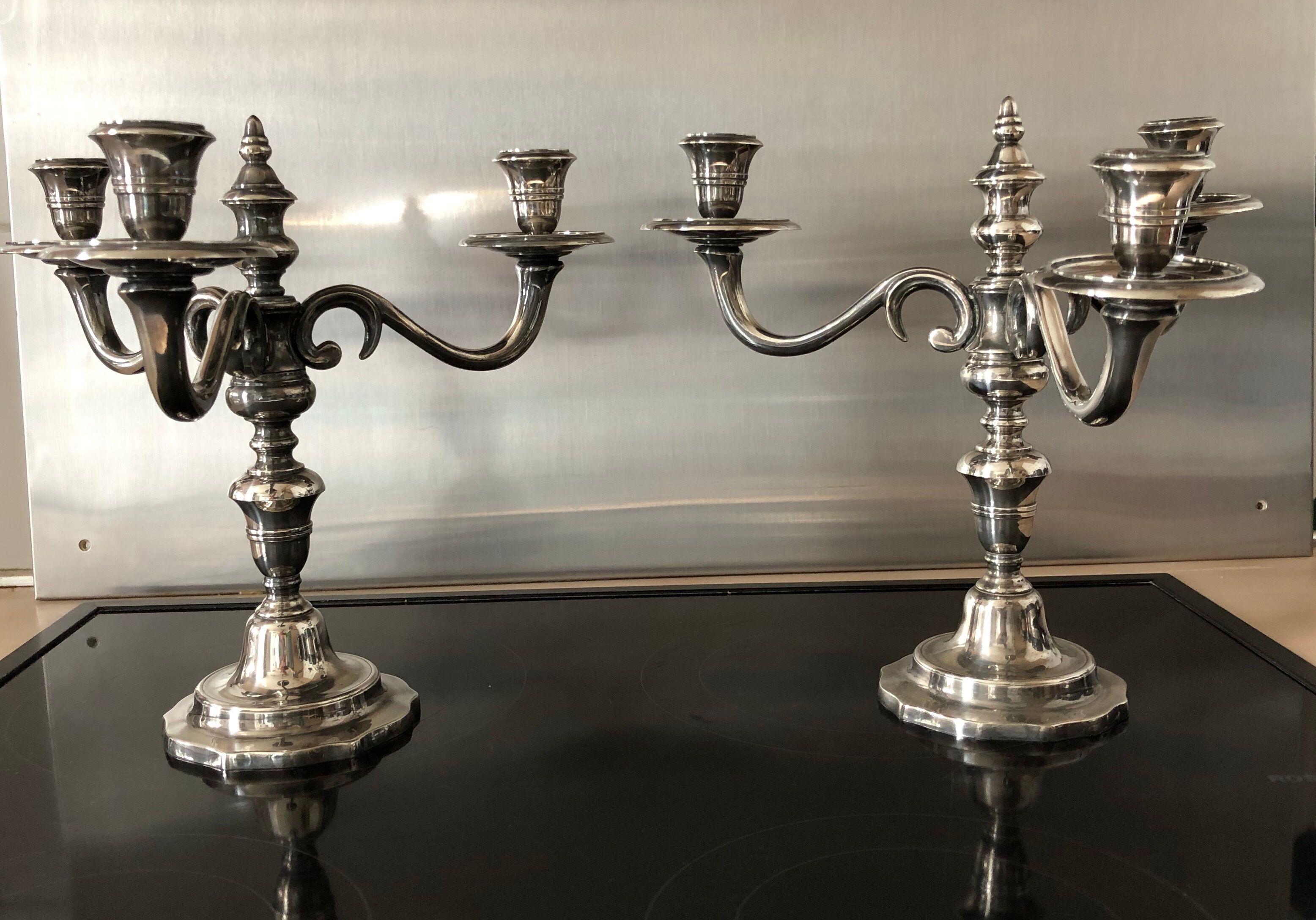 Pair of silver metal candlesticks