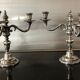 Pair of silver metal candlesticks