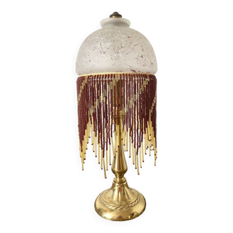 Lampe en laiton et perles, style charleston