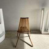 Foldable designer armchair in wooden slats