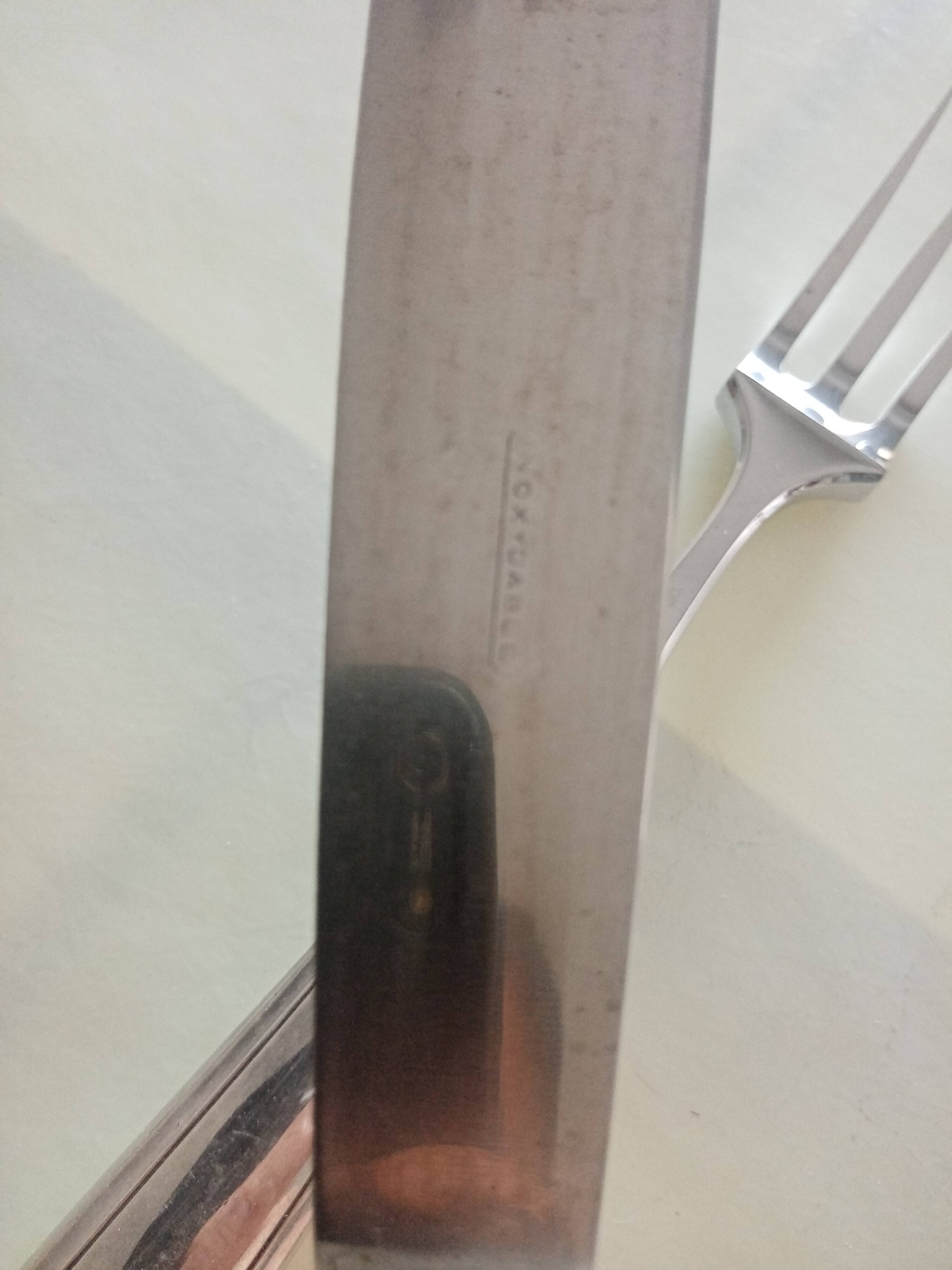 Serving cutlery in silver metal