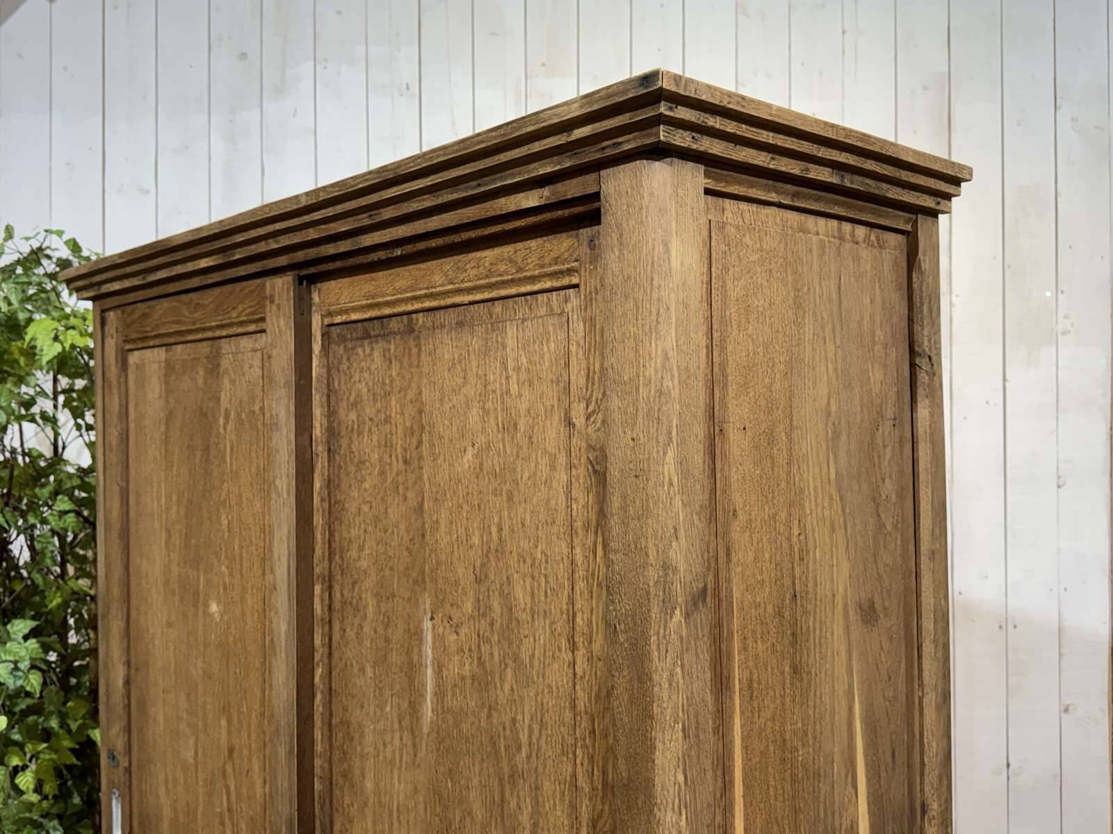 Oak wardrobe with sliding doors from the 1930s.
