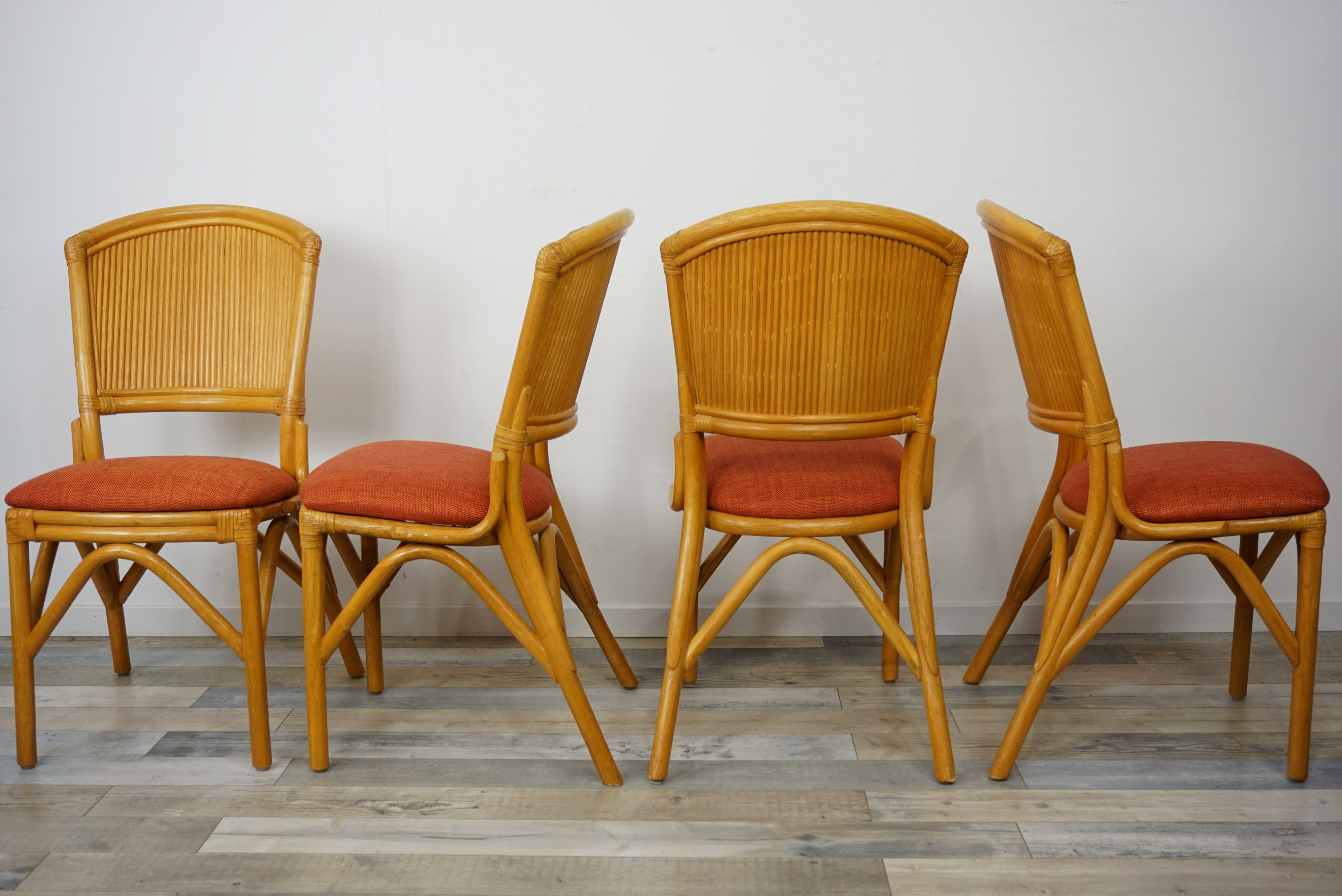 Suite of 4 chairs in Italian rattan design from the 60/70