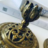 Pair of bronze candle holders signed