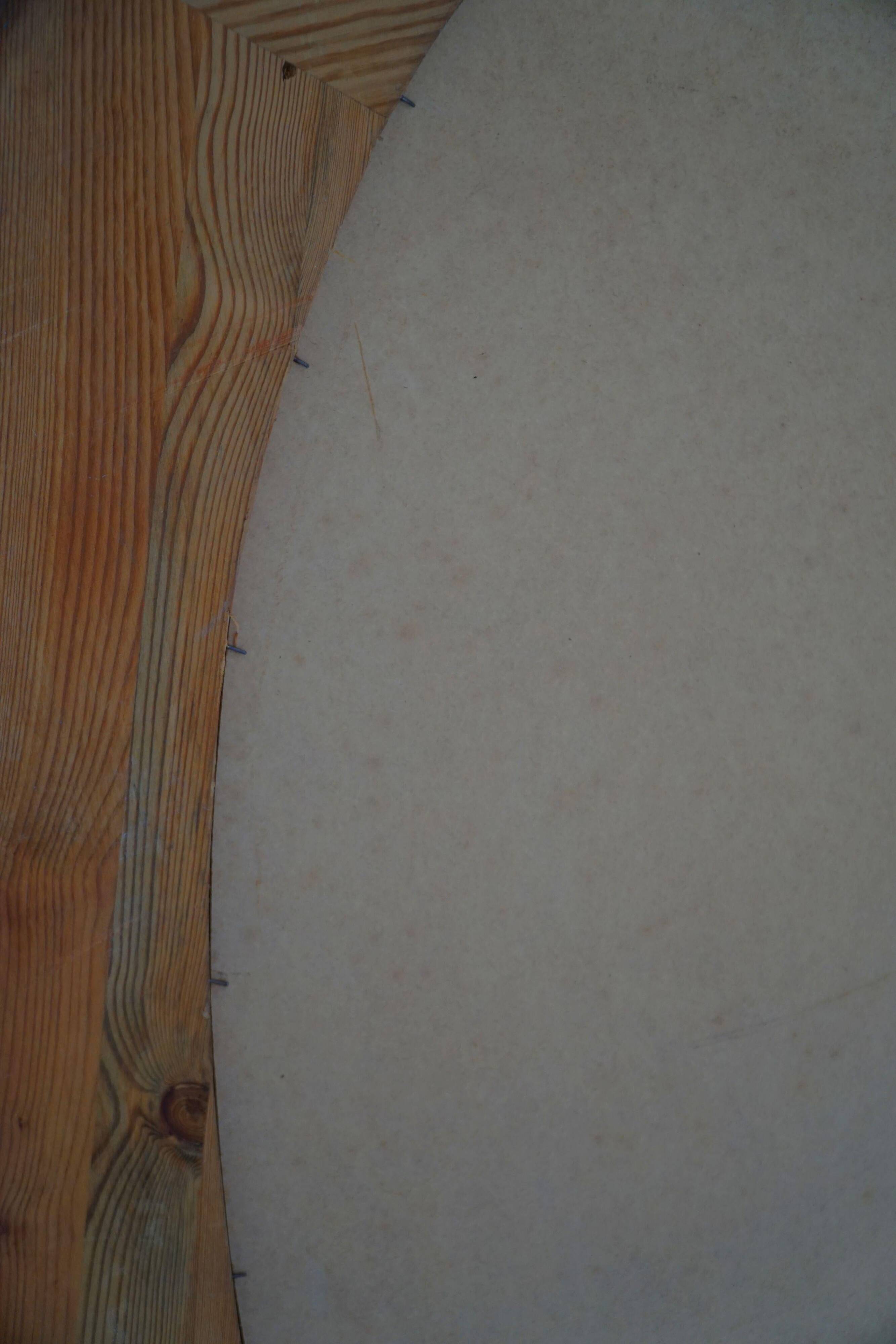 Large oval wall mirror in solid pine by Glasmäster Markaryd, Sweden, 1960s.