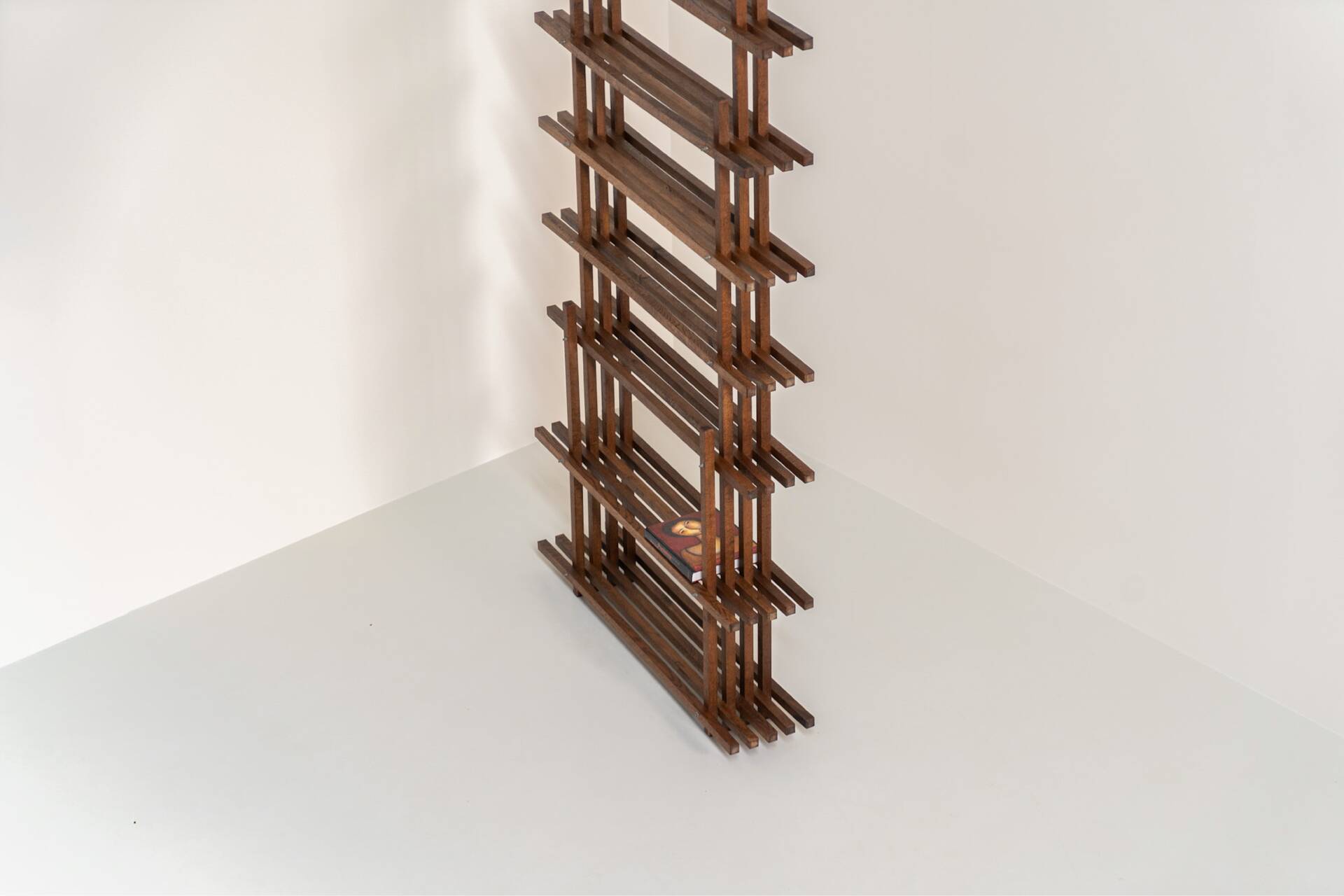 Sculptural wengé slat bookcase (Europe, 1960s).