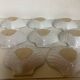 Eight white scallop shell bowls