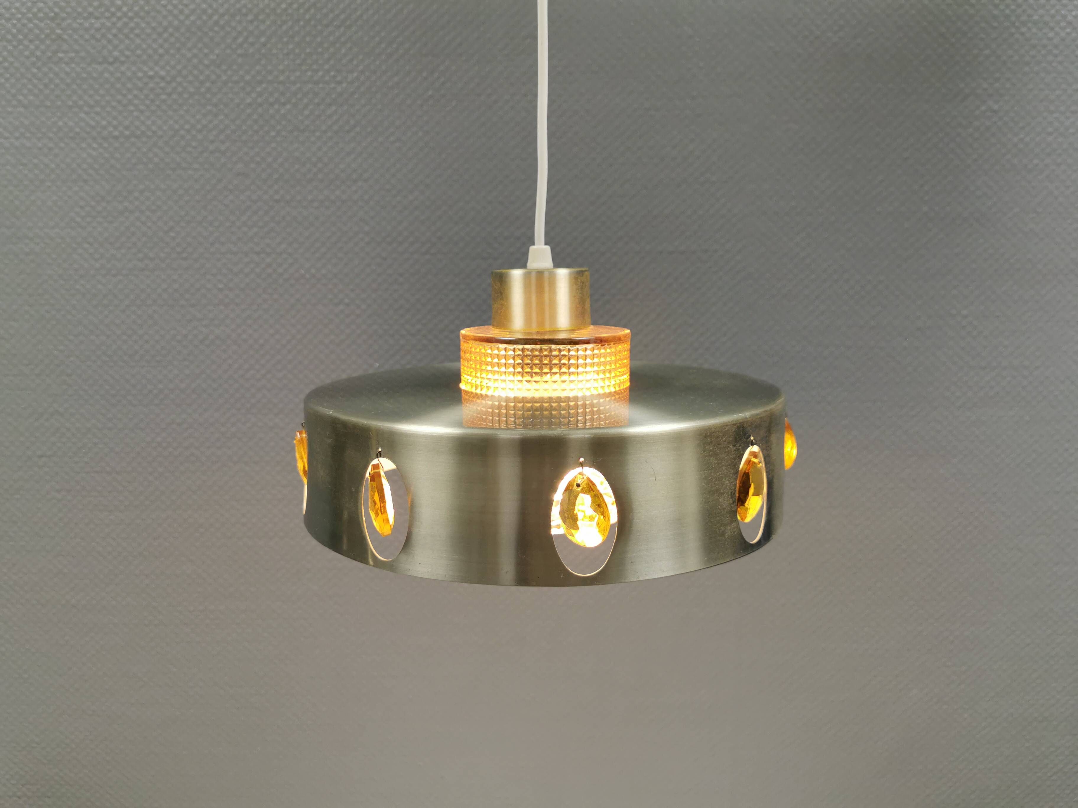 Danish hanging lamp made of glass, metal and with amber colored prisms