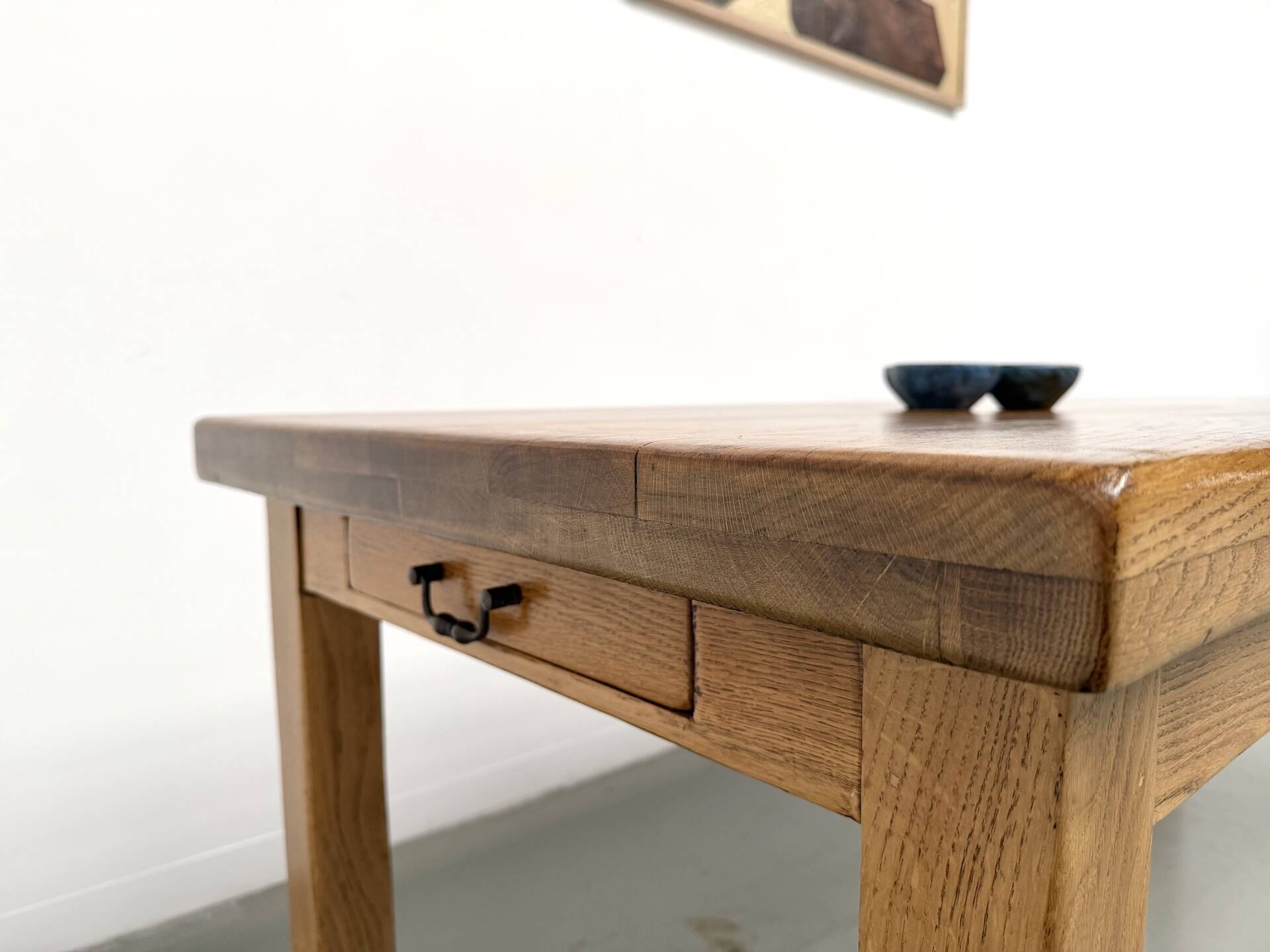 Solid oak farmhouse table, square legs.