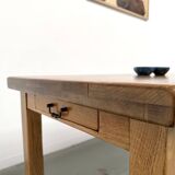 Solid oak farmhouse table, square legs.