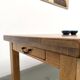 Solid oak farmhouse table, square legs.