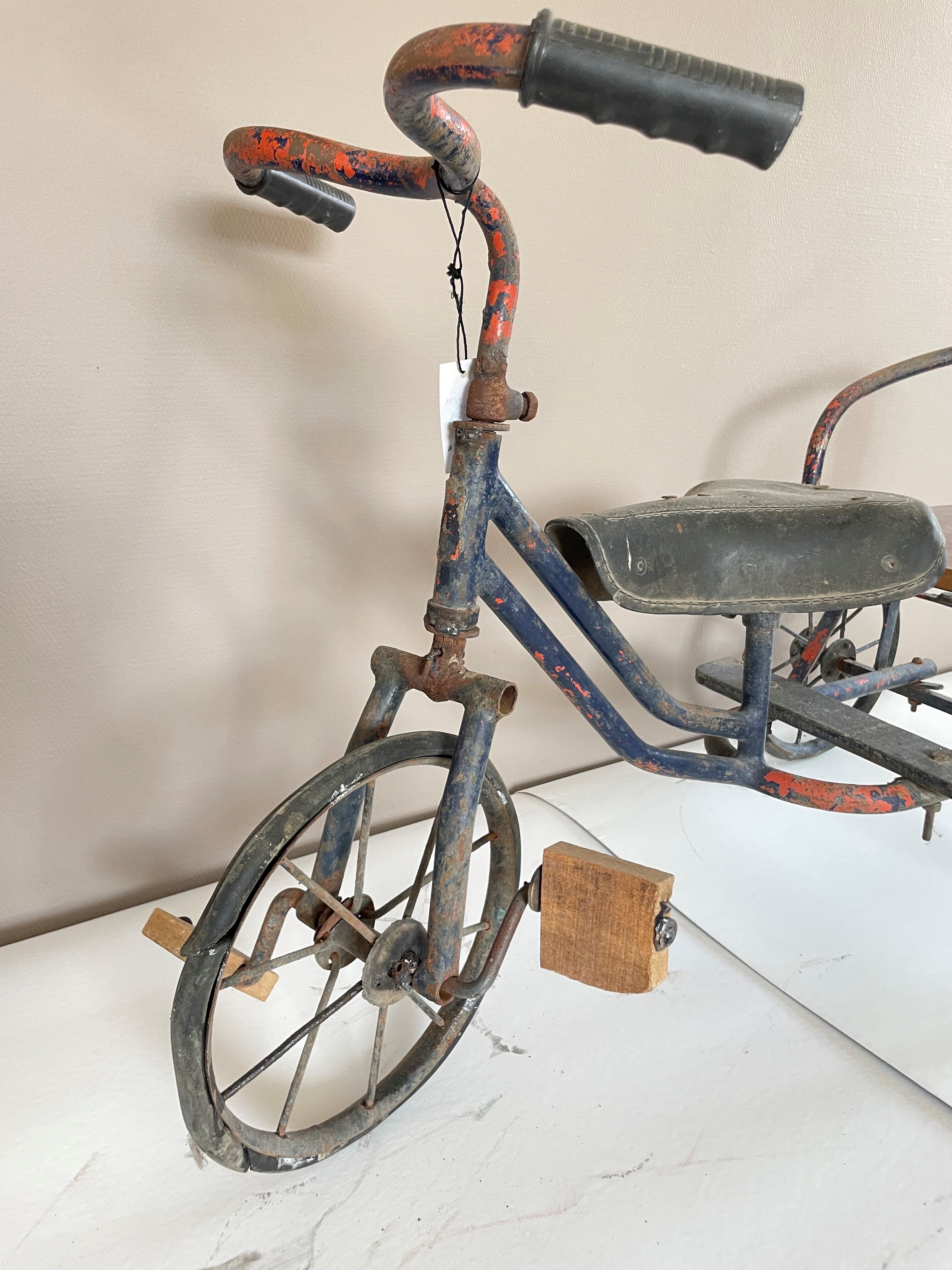 Vintage two-seater antique tricycle